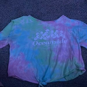 Large tie die shirt kinda cropped not a lot